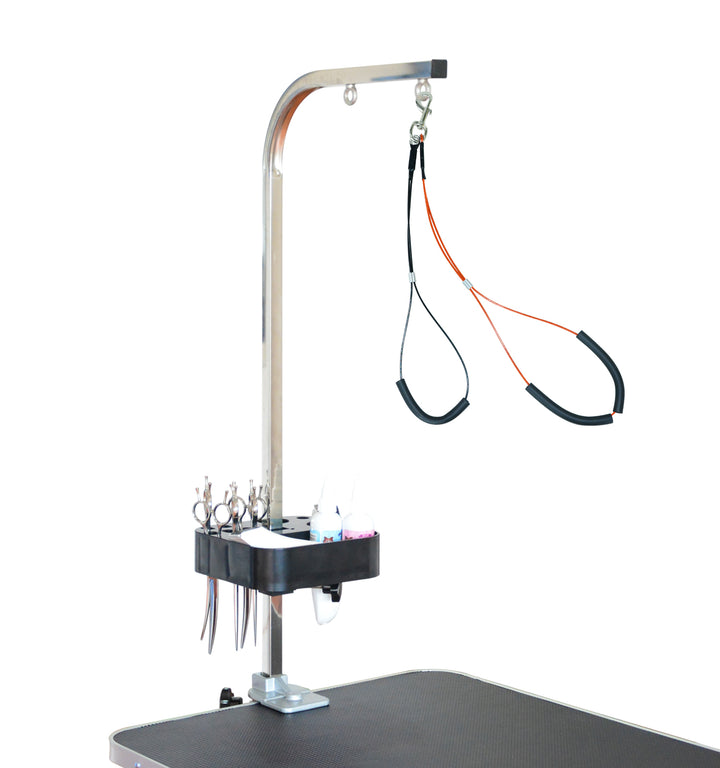 Black tool organiser fitted to a grooming arm beneath neck and haunch loops.