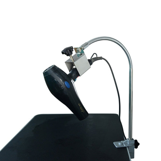 Flexible hair dryer holder clamped to a grooming table and holding a handheld dryer.