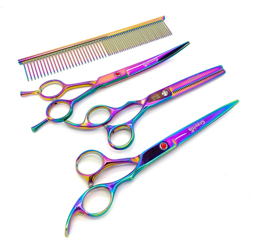 Rainbow-finish grooming set with three pairs of scissors and a metal comb.